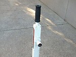 Stand - fixed leg grip